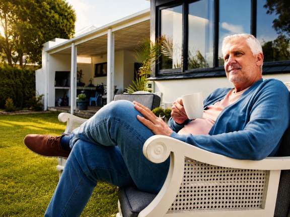Man on chair outside