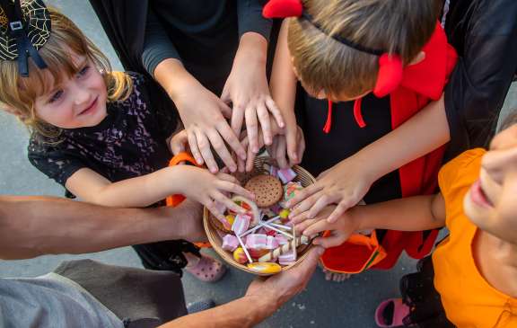 Children celebrate Halloween dressed up in costumes. Selective focus. Kids.