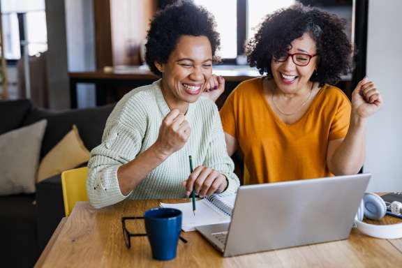 women looking at laptop
