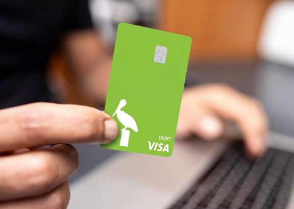 holding Pelican card