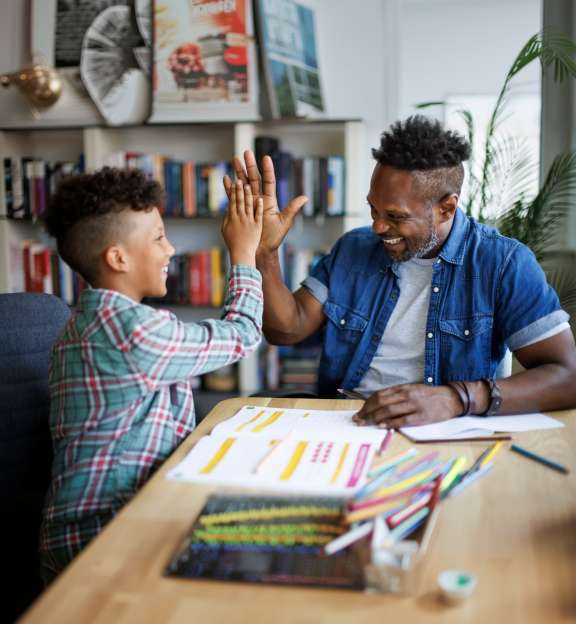 Kid highfiving dad 2