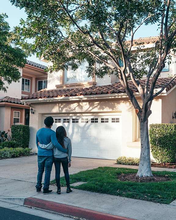 Couple looking at house 2